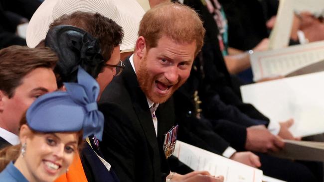 Prince Harry was seen laughing with family members inside St Paul’s Cathedral. Picture: Phil Noble/AFP