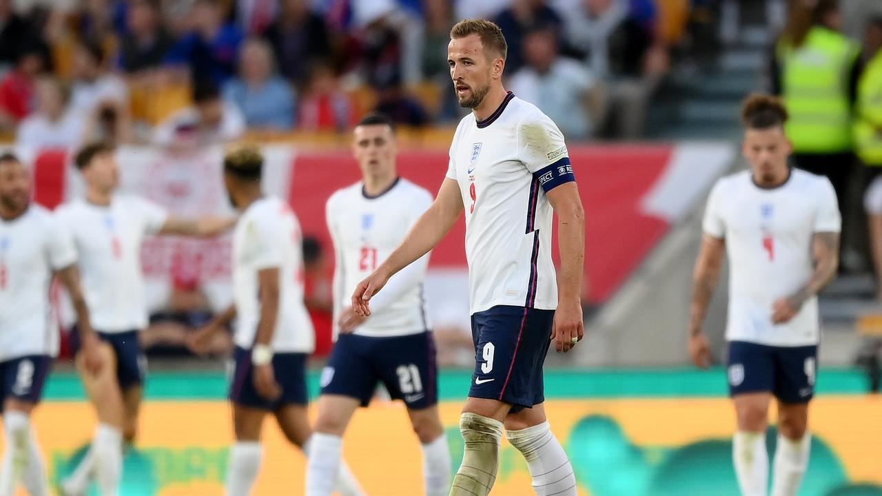 A subdued Harry Kane leads his depleated side after being trounced by Hungary in front of a packed home crowd. Picture: Shaun Botterill/Getty Images