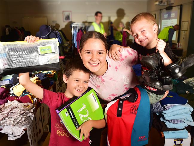 Rhys, 7, Sasha, 14, and Declan,4 , Packham at the School Savvy NQ Pop Up Back to School supply shop. Picture: Shae Beplate.