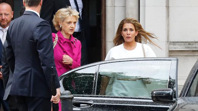 Princess Haya Bint al-Hussein of Jordan (R) leaves the High Court in Londonwith he rlawyer Baroness Shackleton. Picture: AFP.