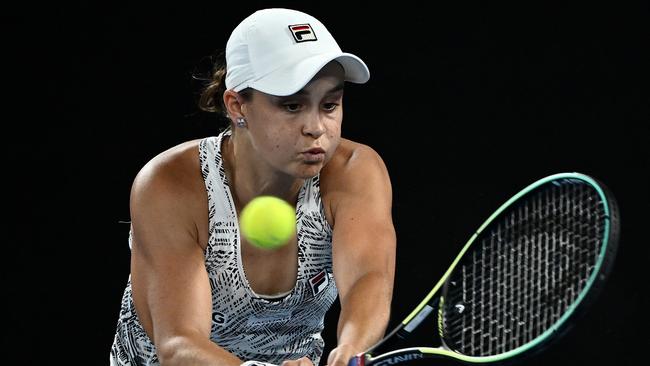 Ashleigh Barty of Australia plays a backhand