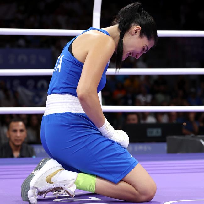 Angela Carini drops to her knees in devastation. (Photo by Richard Pelham/Getty Images)