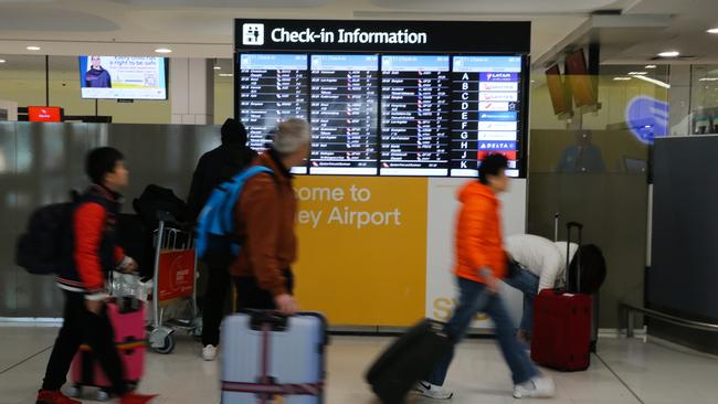 SYDNEY, AUSTRALIA  - AUGUST 15 2023: A general view of the Departures Terminal at Sydney International Airport, after a man who forced a Malaysia Airlines plane to make a dramatic turn back to Sydney International Airport after he became unruly and made references to Islam has been arrested. The MH122 Airbus-a330 flight to Kuala Lumpur was diverted back to Sydney and was isolated on the tarmac with AFP officers called to the emergency just before 4pm on Monday. Picture: NCA Newswire / Gaye Gerard