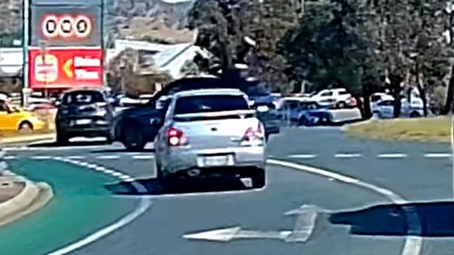 The bike collides with the car, sending the rider flying. Picture: Dashcam Owners Australia