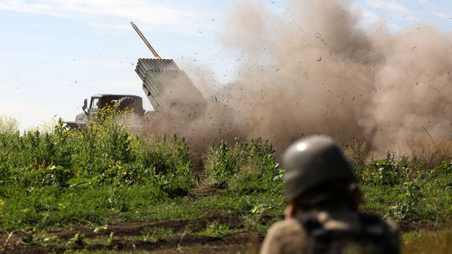 Ukrainian servicemen fire a BM-21 'Grad' multiple rocket launcher towards Russian positions near Bakhmut. Picture: AFP