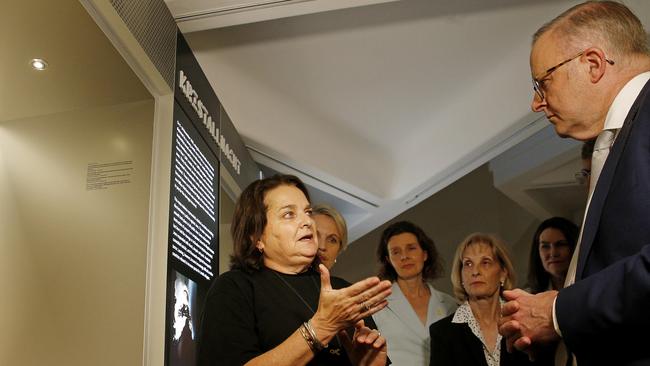 Head of Education at the Sydney Jewish Museum Sandy Hollis shows , Prime minister Anthony Albanese a propaganda display Picture: NewsWire / John Appleyard