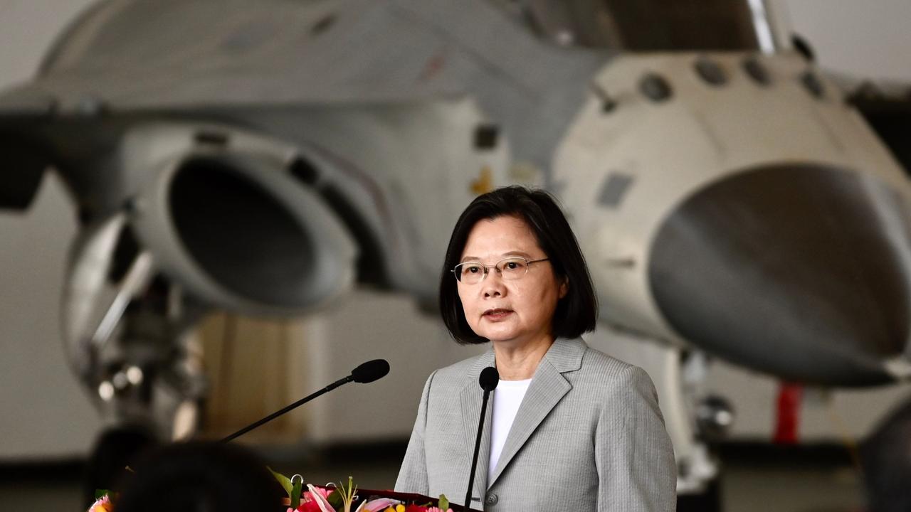 Taiwan's President Tsai Ing-wen speaks in front of a domestically-produced F-CK-1 indigenous defence fighter jet (IDF) during her visit to Penghu Air Force Base on Magong island in the Penghu islands. Picture: Sam Yeh/AFP.