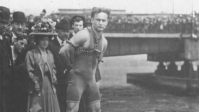 Magician Harry Houdini readys himself for another escape attempt in an undated photo.