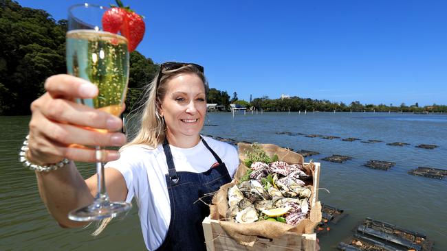 It’s worth shelling out on local oysters and champagne with a view. Belinda Hardy from the The Oyster Shed Picture: Scott Powick.