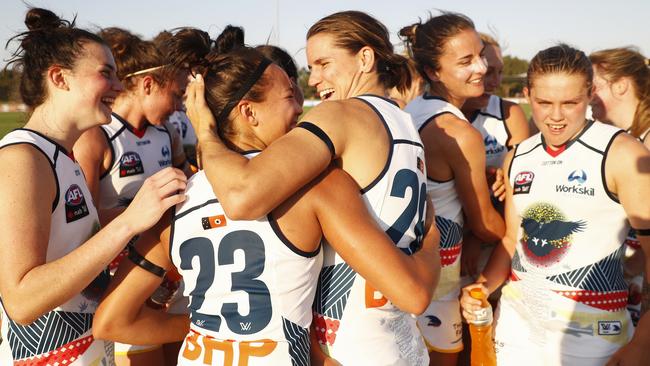 Adelaide players celebrate their dominant victory over Melbourne which sealed a home semi-final. Picture: Daniel Pockett.