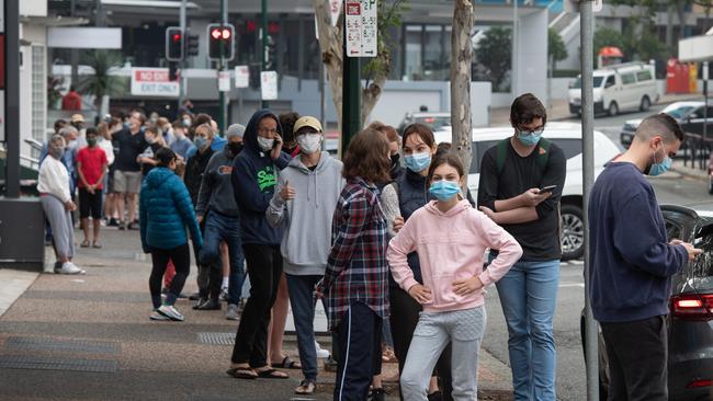 People queue for Covid testing at Toowong Village as Brisbane’s snap three-day lockdown continues. Picture: Brad Fleet