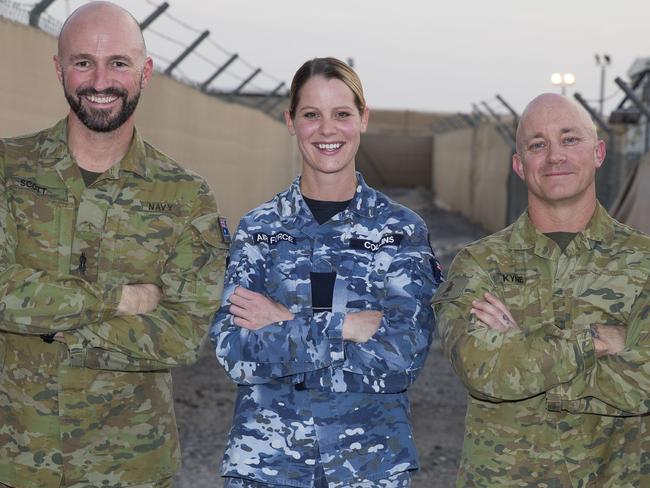  Royal Australian Navy Able Seaman Communication and Information Systems sailor Thomas Scott, Royal Australian Air Force officer Flying Officer Cassie Collins and Australian Army soldier Sergeant Terry Kyne at the main operating base in the Middle East Region. Picture: Defence Media