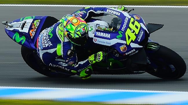 Movistar Yamaha MotoGP's Italian rider Valentino Rossi rides during the MotoGP Free Practice 4 of the Spanish Grand Prix at the Jerez racetrack in Jerez de la Frontera on April 23, 2016. / AFP PHOTO / Cristina Quicler