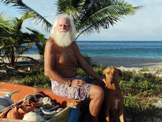 David Glasheen, 65yrs, pictured with his dog Quasi, lives on remote Restoration Island off Cape York Peninsula and has joined an online dating agency to try and meet a woman to share his island home. PIC: by BRIAN CASSEY - NOT FOR NEWSPIX