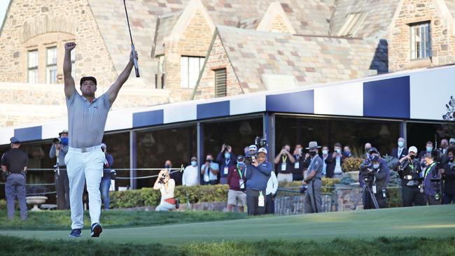 Bryson DeChambeau celebrates on the 18th green after winning the US Open. (Photo by Jamie Squire/Getty Images)