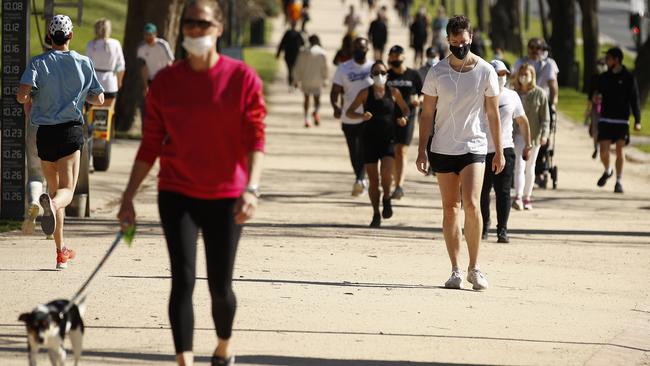 People enjoying exercise at the Tan track in Melbourne, Victoria. Picture: NCA NewsWire / Daniel Pockett