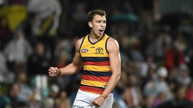 Riley Thilthorpe of the Crows celebrates a goal. Picture: Albert Perez/AFL Photos/via Getty Images