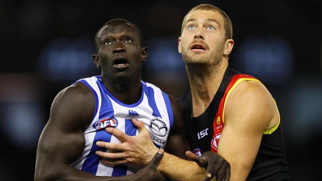 North Melbourne coach Brad Scott was frustrated by how easily Majak Daw was pushed around by Essendon’s Tom Bellchambers. Picture: Michael Klein