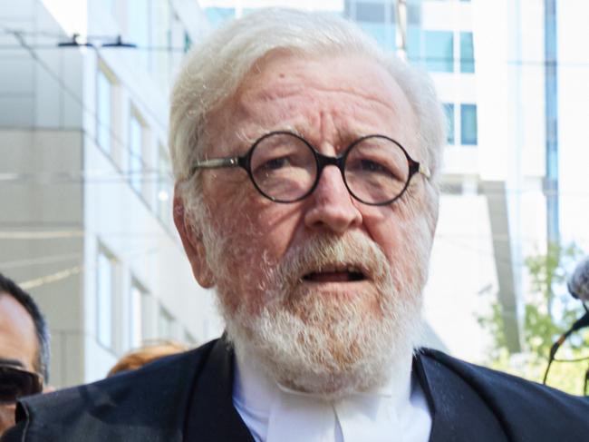 Cardinal George Pell's lawyer Robert Richter QC leaves the County Court in Melbourne, Australia, Wednesday, February 27, 2019. Cardinal Pell, once the third most powerful man in the Vatican and Australia's most senior Catholic, has been found guilty of child sexual abuse after a trial in Melbourne. (AAP Image/Erik Anderson) NO ARCHIVING