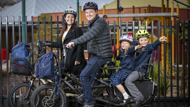 The van Eyk family loves their e-bikes. Mother Andrea, father Philip, with Eleanor, 5 and Peter, 9, use two electric cargo bikes to get the kids to school in Colonel Light Gardens. Picture: Emma Brasier