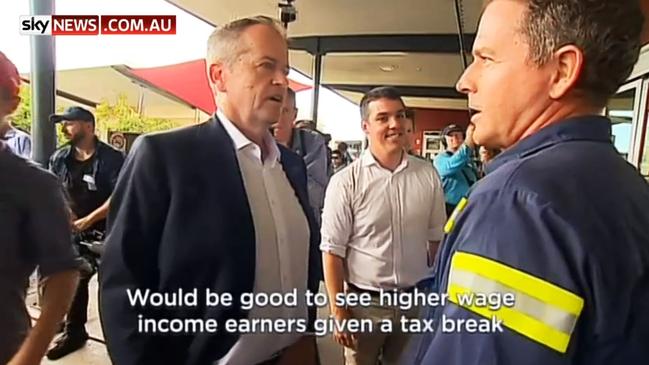 A Gladstone worker talks to Bill Shorten tax cuts for higher-income earners.