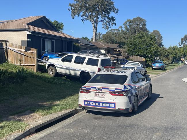 Police outside a Bellmere property where a man was shot during a violent home invasion. Picture: Aaron Goodwin