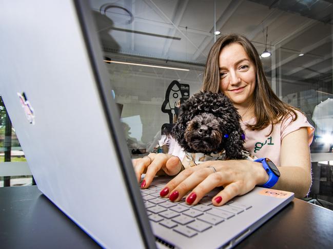 The tech industry is booming with more and more people making the switch during the pandemic, the industry is set to grow to one million in the next four years.Heather Morgan with her dog Brena. Picture: NIGEL HALLETT