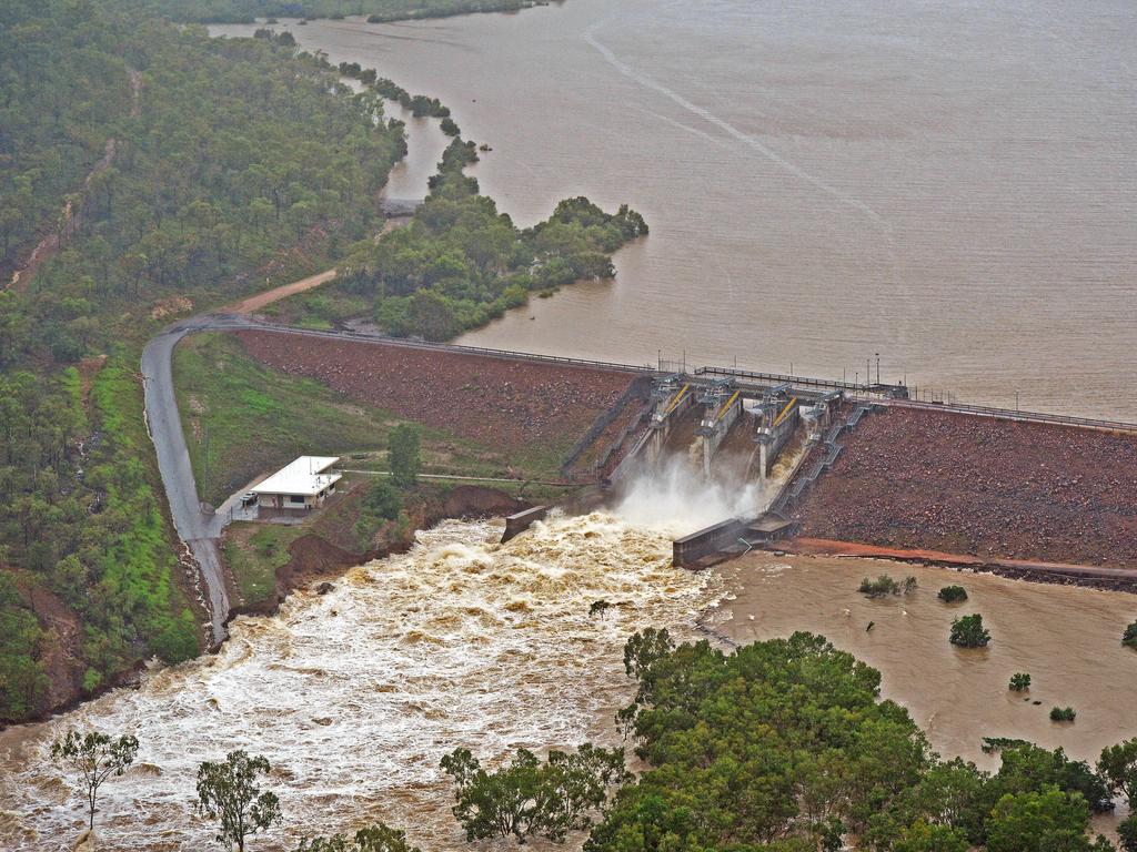 The Ross River Dam releases water during the floods.