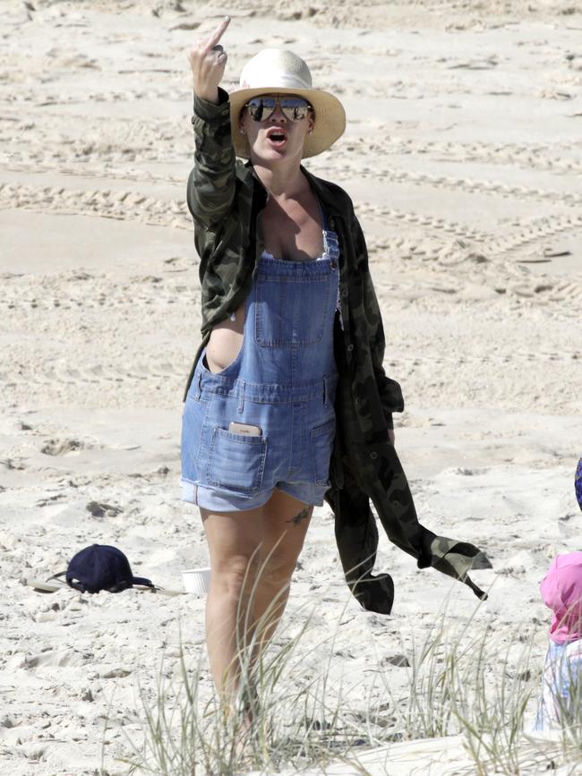 Superstar singer Pink on the beach with her husband Carey Hart and children Jameson and Willow after she arrived on the Gold Coast for her performance in Brisbane. Picture: Matrix