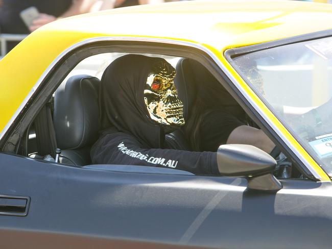 Driver dresses up while driving around tough street at Summernats 31 2018. Photo: Keegan Carroll