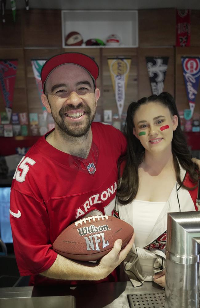 Enjoying the Super Bowl party at Tailgate Sports Bar in the Toowoomba CBD are venue owner Ben Whibley-Faulkner and Kirsty Cawkwell.