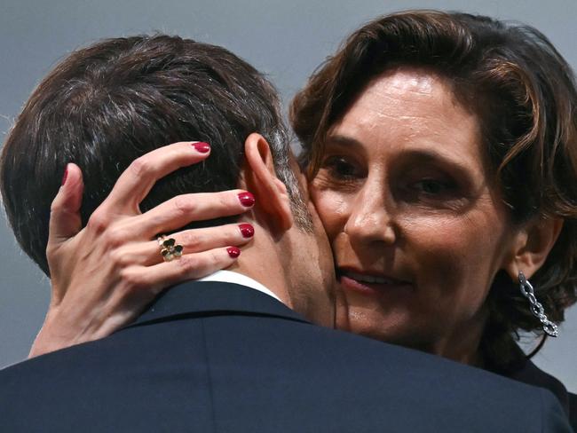 Emmanuel Macron greets Amelie Oudea-Castera during the Opening Ceremony. Picture: Fabrice Coffrini/AFP