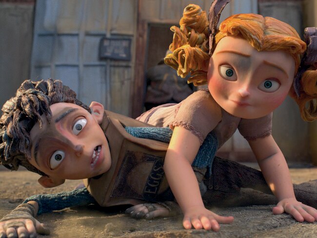 Eggs (voiced by Isaac Hempstead-Wright) and Winnie (Elle Fanning) in a scene from The Boxtrolls.