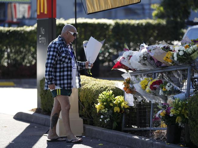 Flowers being left in the car park where Steven Tougher was randomly attacked and killed. Picture: Tim Hunter.