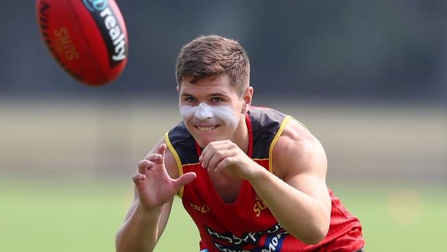 GOLD COAST, AUSTRALIA – DECEMBER 09: Connor Budarick catches during a Gold Coast Suns AFL training session at Metricon Stadium on December 09, 2019 in Gold Coast, Australia. (Photo by Chris Hyde/AFL Photos/Getty Images)