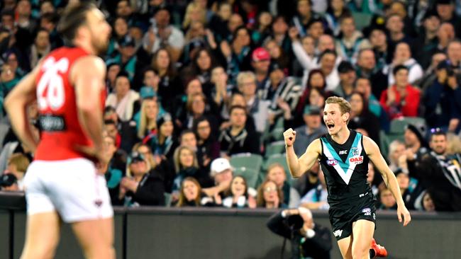 Kane Farrell celebrates a goal for Port Adelaide against Essendon on Friday. Picture: AAP Image/Kelly Barnes