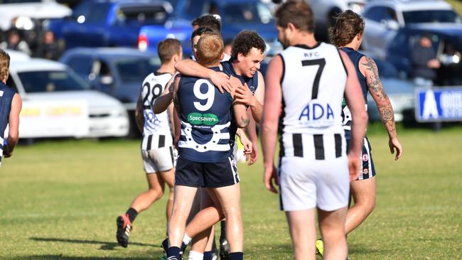 Troy Johnson (middle) celebrates against Reynella. Picture: Keryn Stevens