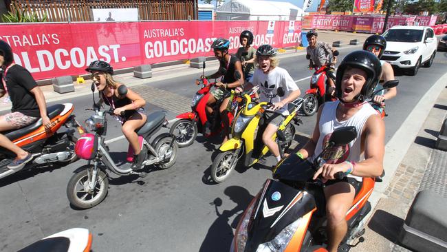 Mopeds are the transport of choice for thousands of schoolies. Picture Mike Batterham