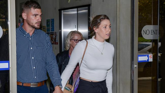 Nurse and AFLW player Deni Varnhagen leaves the District Court with her partner Jarrad Duthie. Picture: NCA NewsWire / Brenton Edwards