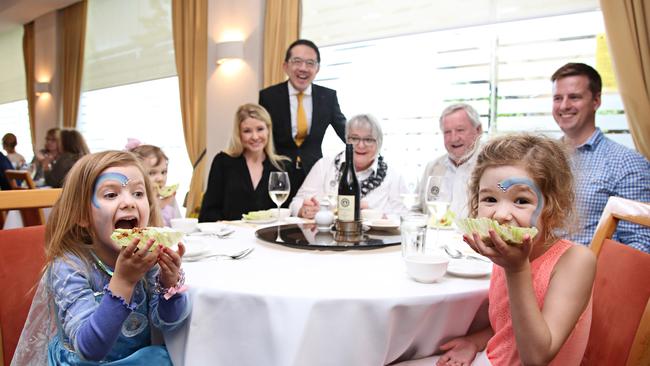 Mathew Chan's Peacock Gardens restaurant turns 40 this year with Mathew still firmly in the driving seatjoined by staff who have been there 30 plus years. Mathew with three generations of the Sinclair family, a signature dish, Sang Choy Bow, and one of the special bottles of wines made for the restaurant. Photographer: Adam Yip.