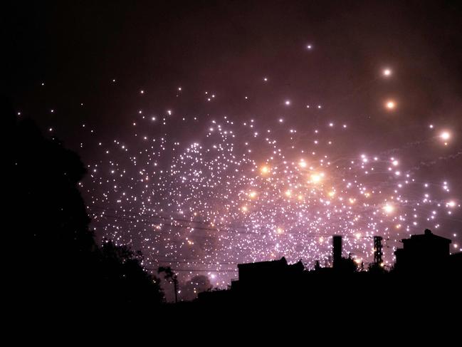 Sparks fly at the site of an Israeli air strike on the outskirts of the southern Lebanese village of Zawtar. Picture: AFP