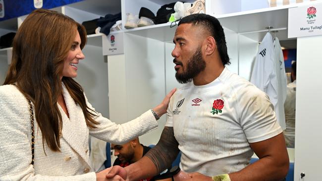 Princess Kate congratulates Manu Tuilagi of England in the changerooms. (Photo by Dan Mullan/Getty Images)