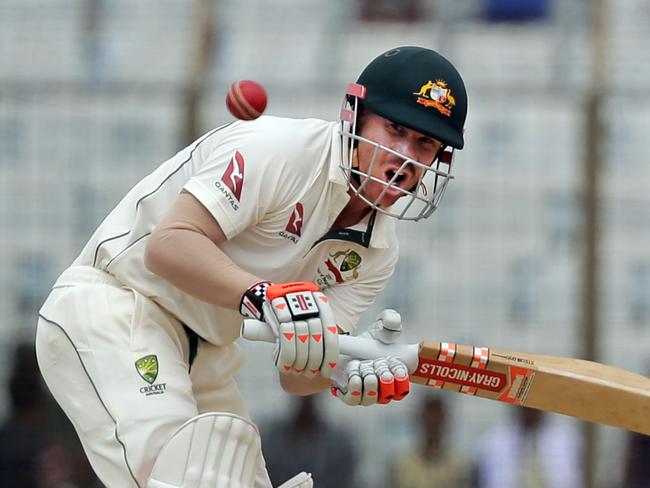 Australia's David Warner plays a shot during the second day of their second test cricket match against Bangladesh in Chittagong, Bangladesh, Tuesday, Sept. 5, 2017. (AP Photo/A.M. Ahad)