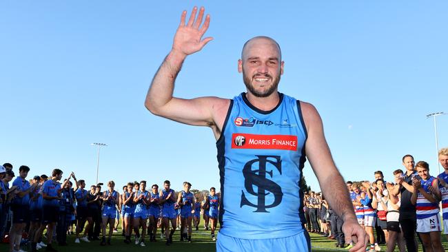 Dual Magarey Medallist and premiership captain Zane Kirkwood walks from the ground after his final SANFL game. Picture: Kelly Barnes