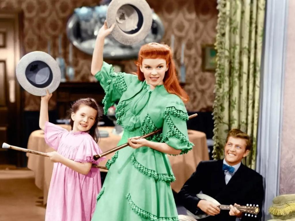 16. Meet Me in St. Louis (1944)<br/>This classic musical will transport you back to a simpler time, with stunning period costumes and a wholesome family vibe. Set in St. Louis at the turn of the 20th century, the film follows the Smith family and the excitement of the upcoming World’s Fair. But let’s be real, we’re mostly here for Judy Garland’s iconic rendition of “Have Yourself a Merry Little Christmas,” which will have you reaching for the tissues and belting out the high notes.