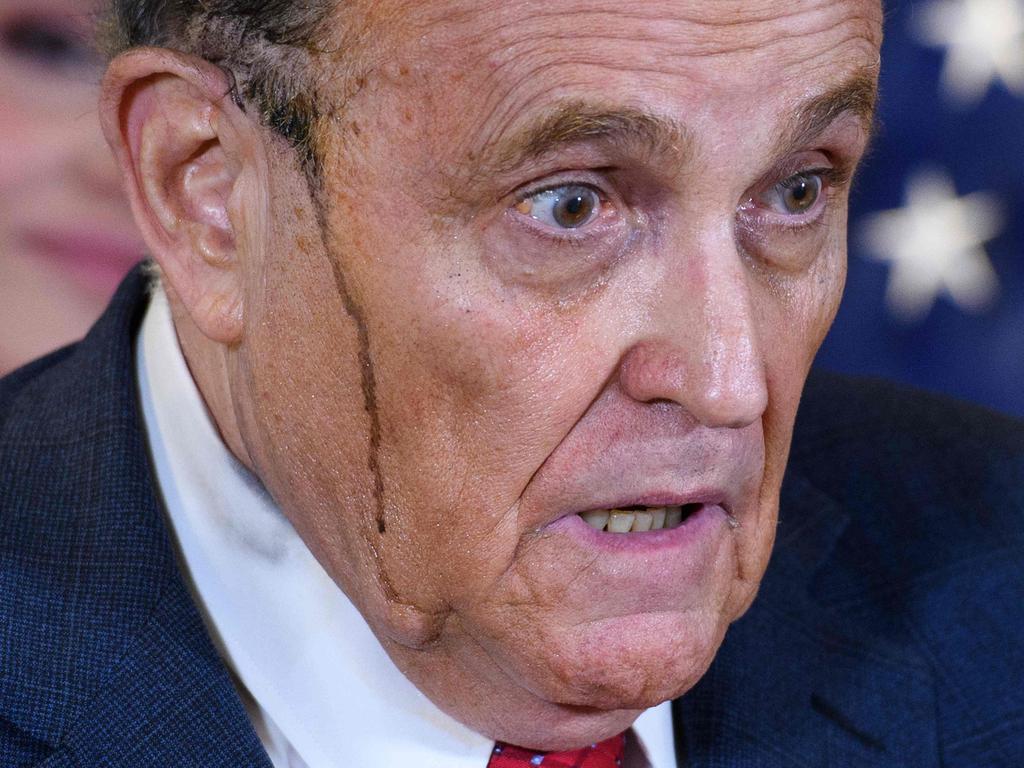 US President Donald Trump's personal lawyer Rudy Giuliani perspires as he speaks during a press conference at the Republican National Committee headquarters in Washington. Picture: AFP