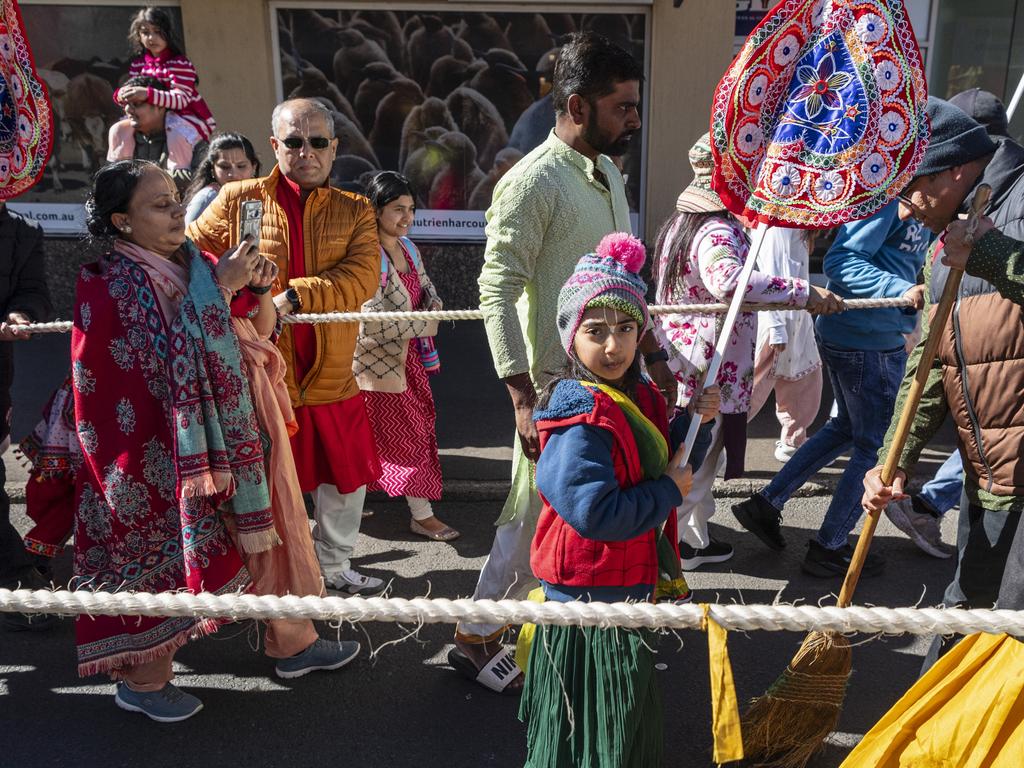 Antra Chaudhari walks between the chariot ropes as it is pulled along Neil St in Toowoomba's Festival of Chariots, Saturday, July 20, 2024. Picture: Kevin Farmer