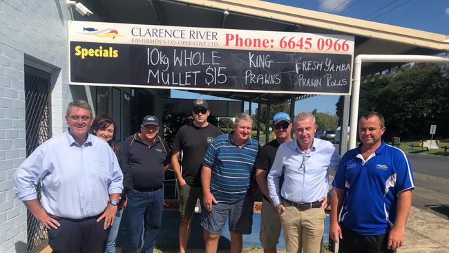 Clarence MP Richie Williamson (left), Page MP Kevin Hogan (second from right) and members of the Clarence River Fisherman's Co-Operative have urged governments to provide income support since the beginning of the outbreak.