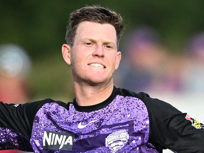 HOBART, AUSTRALIA - DECEMBER 21: Mitch Owen of the Hurricanes celebrates scoring a century during the BBL match between Hobart Hurricanes and Perth Scorchers at Blundstone Arena, on December 21, 2024, in Hobart, Australia. (Photo by Steve Bell/Getty Images)