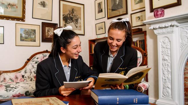 Super sleuths: Wilderness College year 11 students Ella Haseldine and Havana George, who discovered the fifth sister of the founders of their school. Photo: Morgan Sette.